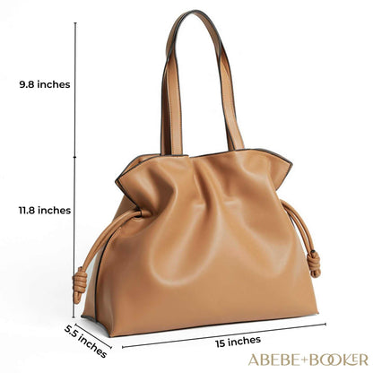 Soft Leather Tote in genuine leather with drawstring closure, dimensions 15" x 5.5" x 11.8".