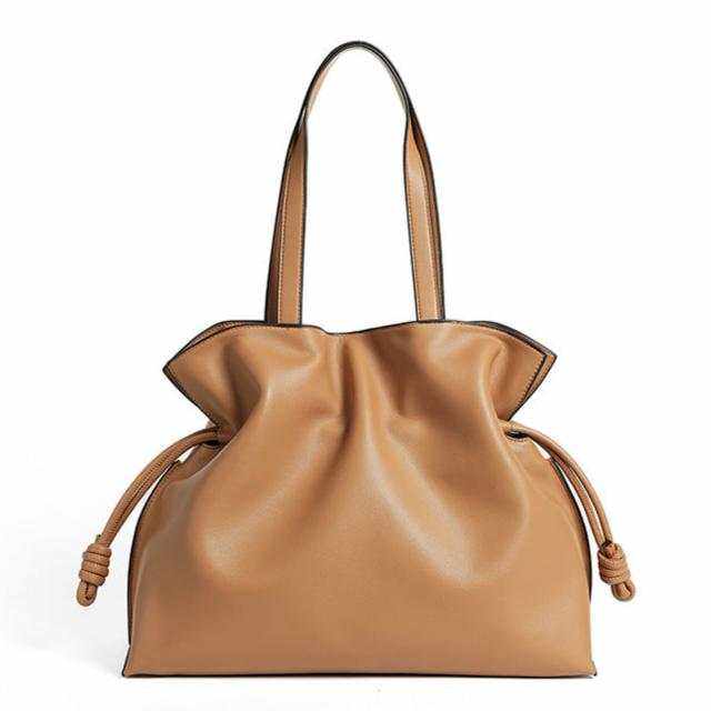 Soft Leather Tote with pleated exterior and drawstring closure, part of the Essence of Elegance Handbag Collection.