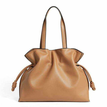 Soft Leather Tote with pleated exterior and drawstring closure, part of the Essence of Elegance Handbag Collection.