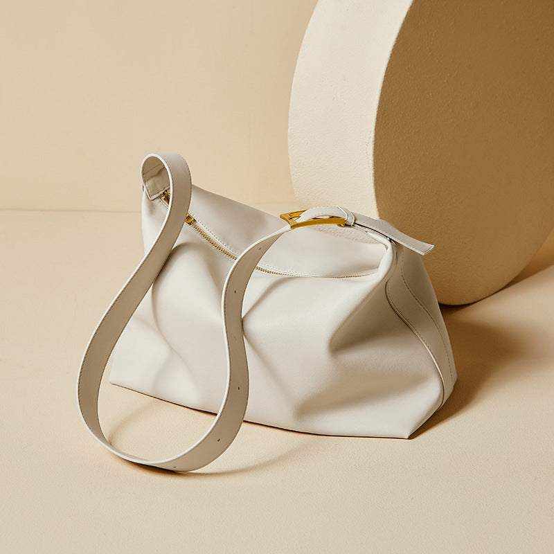 Softest Leather Handbag in off-white, luxury cowhide leather, elegant and versatile design.