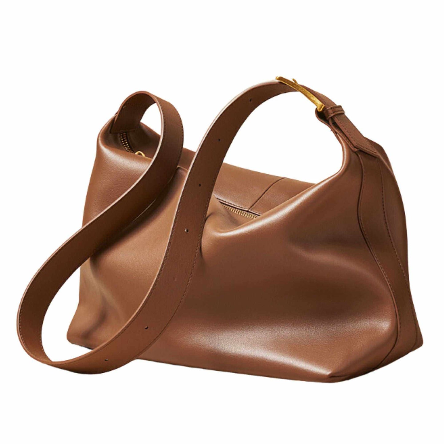 Softest leather handbag in caramel color with a sleek, elegant design.