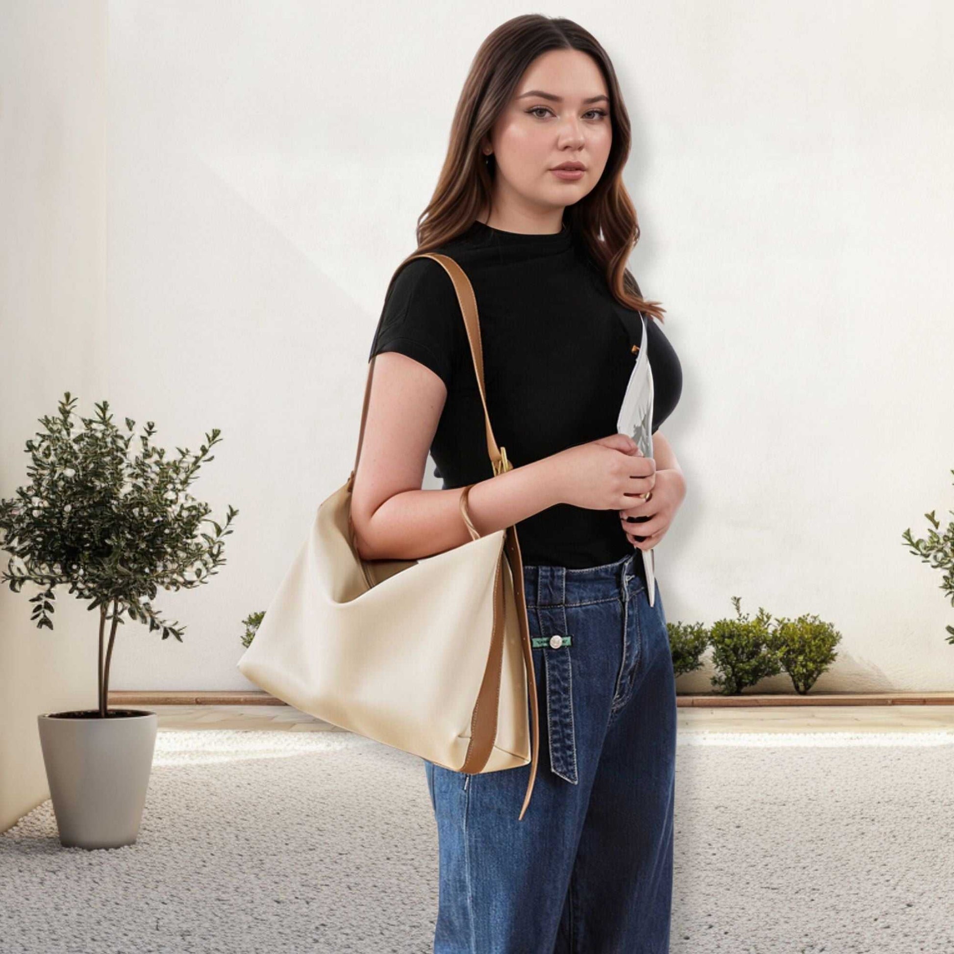 Softest Leather Handbags; modern woman carrying luxurious beige handbag in stylish outfit, showcasing sophistication and versatility.