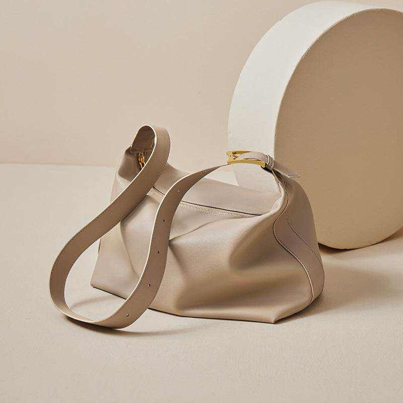 Softest Leather Handbag in neutral color with elegant design, from the Essence of Elegance Handbag Collection.