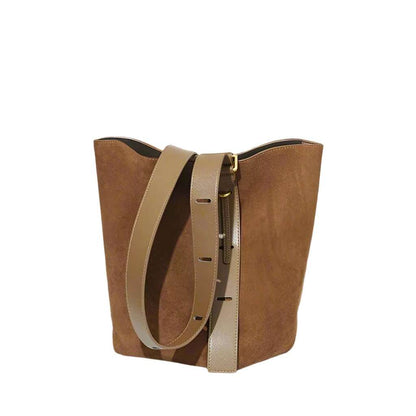 Suede bucket bag with adjustable strap in brown, crafted from genuine nubuck leather.