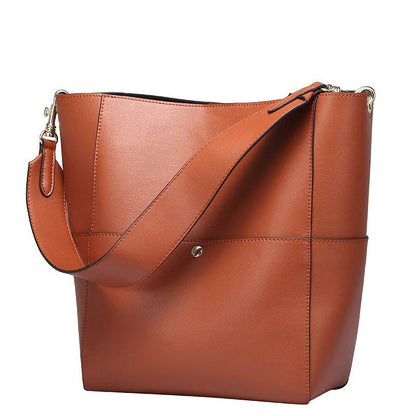 Genuine leather women's bucket bag with removable shoulder strap.