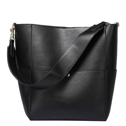 Elegant genuine leather women's bucket bag with removable shoulder strap and multiple storage pockets.