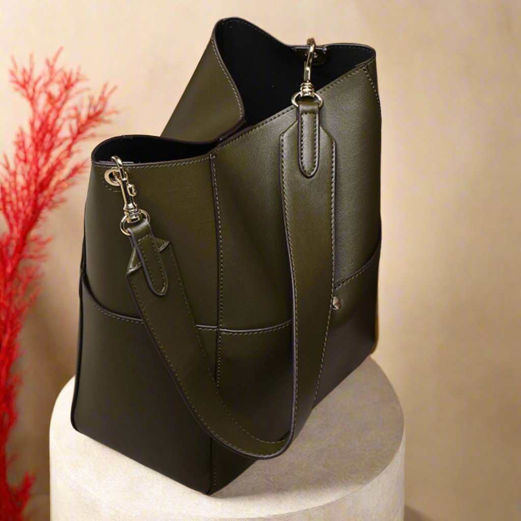 Elegant women's bucket bag made from genuine leather with a removable shoulder strap.