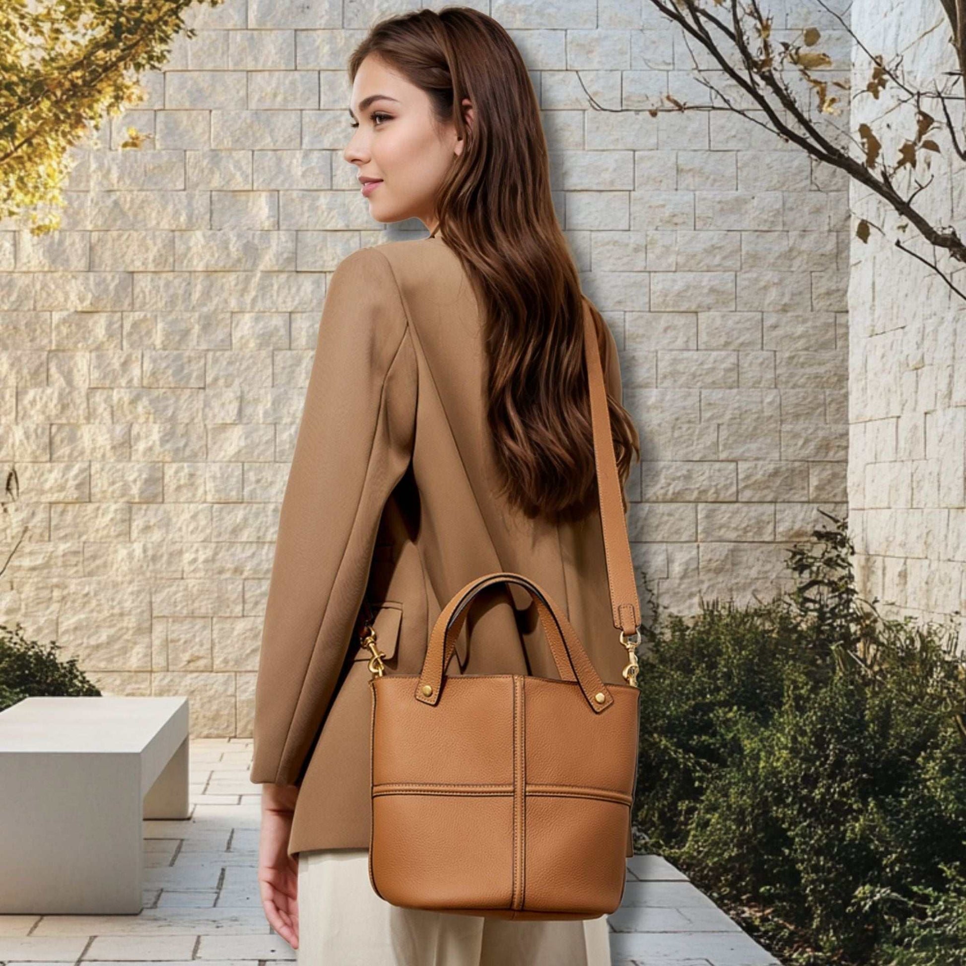 Women's leather work bag with versatile design, suede material, and spacious interior, ideal for professionals.