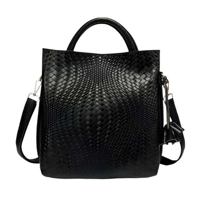 Woven Leather Handbag with black woven design and detachable strap.