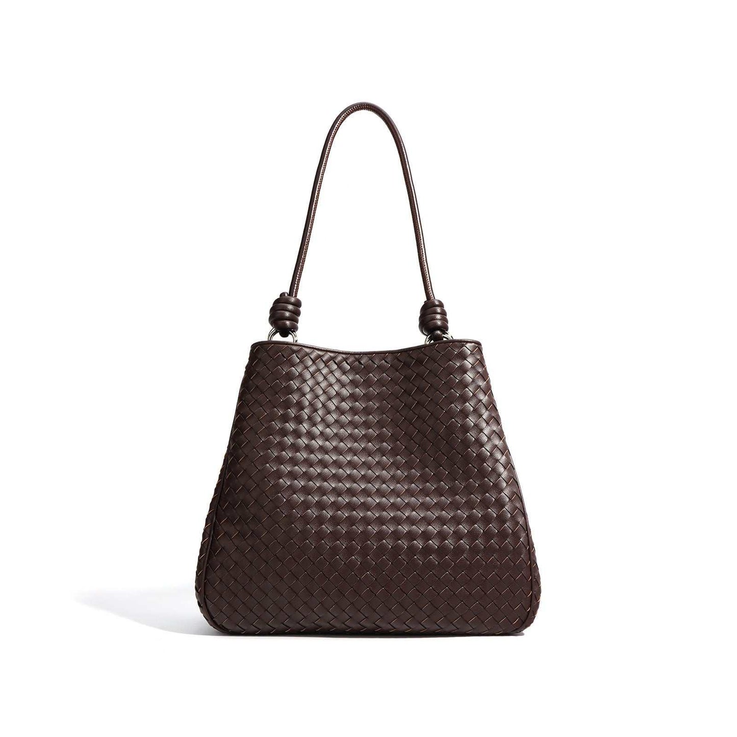 Woven leather tote bag with basket weave design and leather rod handles.