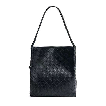 Black woven leather tote handbag with a spacious design and elegant craftsmanship.