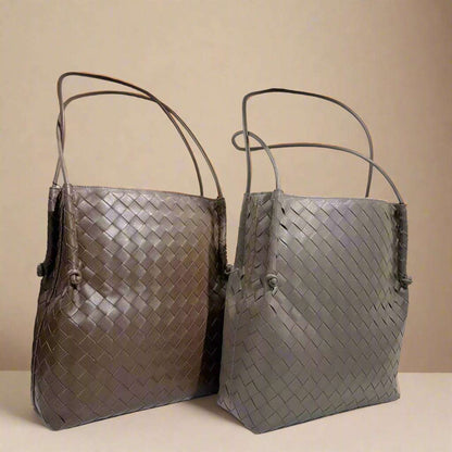 Woven leather tote handbags with embossed pattern, showcasing elegant design and practicality.