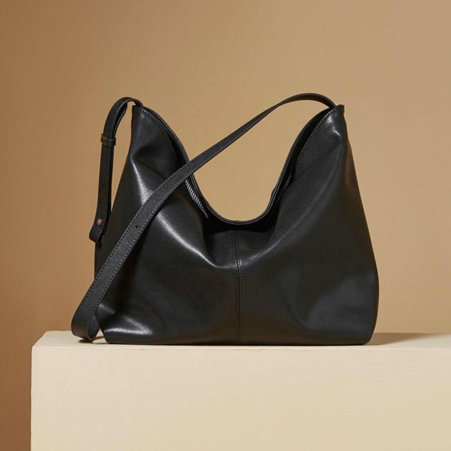 Slouchy Leather Purse in black on display